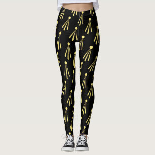 Gelbe Sonnenstrahlen auf Schwarz Leggings