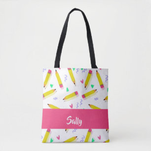 Gelbe Stifte und Scrables auf weiß Tasche