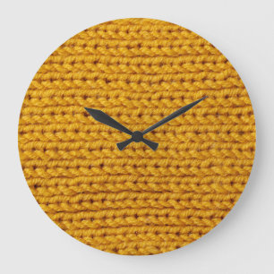 Gelbe Strickwolle, hochauflösende Textur. Große Wanduhr