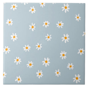 Gelbe und weiße Milchsorten auf pastellblau Fliese