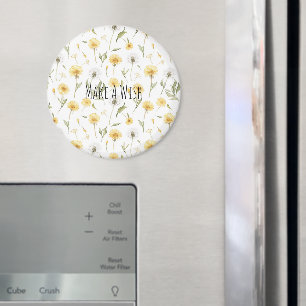 Gelbe weiße Löwenzahnblumen wünschen sich etwas Magnet