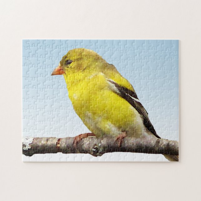 Gelber Goldfinch-Vogel auf blauem Puzzlespiel (Horizontal)