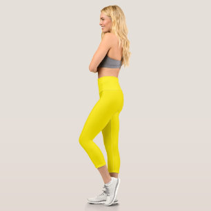 gelber Hintergrund mit schwarzer Grenze Capri Leggings