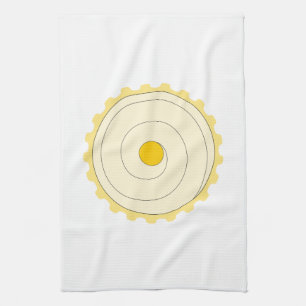 Gelber kleiner Kuchen. Gefrorener Kuchen Geschirrtuch