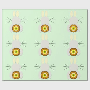 Gelber Osterhase auf grünem Geschenkpapier
