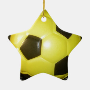 Gelber und schwarzer Fußball. Keramikornament