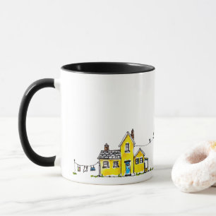 Gelbes Haus mit Wäsche Tasse