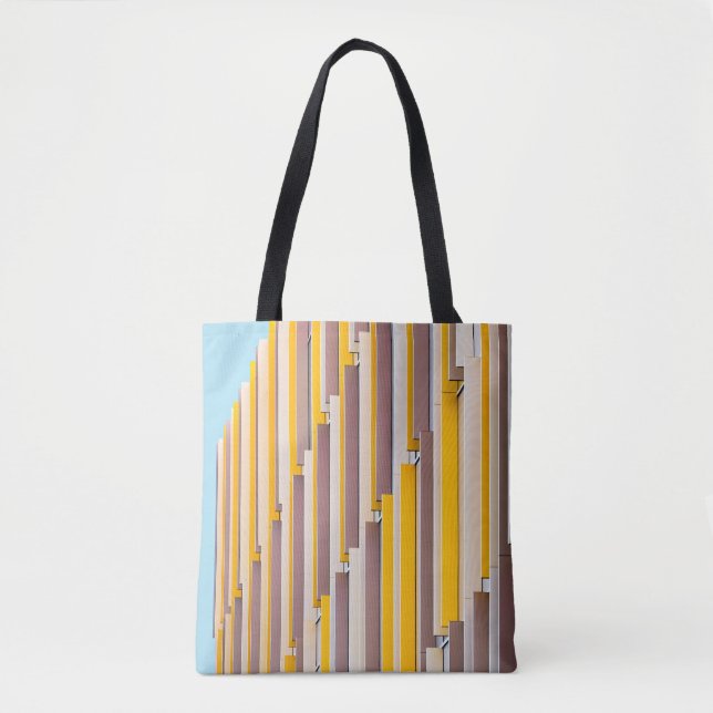 GELBES KONKRETES GEBÄUDE AM TAG TASCHE (Vorderseite)