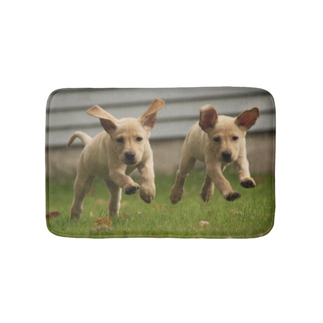 Gelbes Labrador-Welpen-Laufen Badematte (Vorderseite)