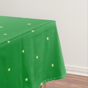 Gelbes Sternmuster auf Grün Tischdecke