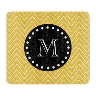 Gelbes Zickzack schwarzes Monogramm des Muster- Schneidebrett