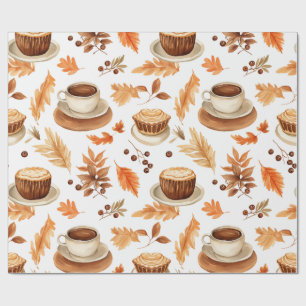 Gemütliche Herbst-Kaffeetassen und Blätter in warm Geschenkpapier