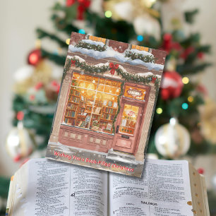 Gemütliche Weihnachtsgrüße aus einer Buchhandlung Feiertagspostkarte