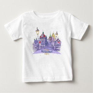 Gemütliche Winterstadt-Illustration mit schneereic Baby T-shirt