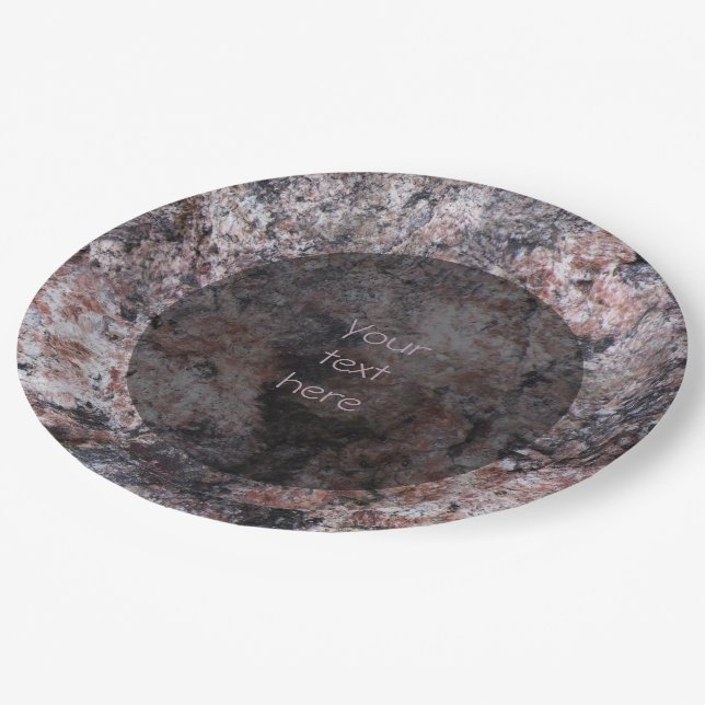 Geologie-Pinkish Felsen-Beschaffenheit irgendein Pappteller (Schrägansicht)