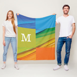geometrisch monogramm farbiges Design Fleecedecke