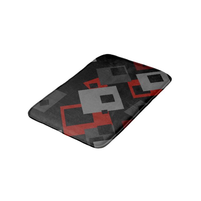 Geometrische Badematte aus schwarzem Rot und Grau (Schrägansicht)