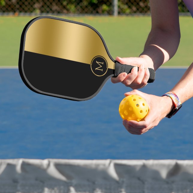 Geometrisches Design aus Schwarz und Gold, gespalt Pickleball Schläger (InSitu)