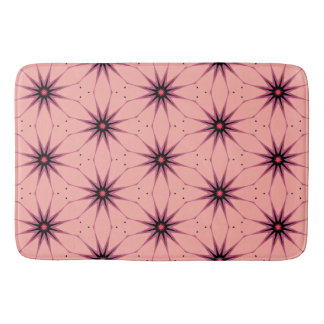 Geometrisches Muster der rosa Sternexplosion Badematte
