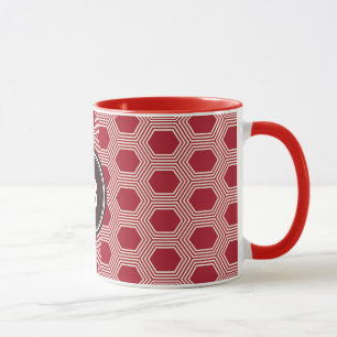 Geometrisches Mustermonogramm der schicken roten Tasse