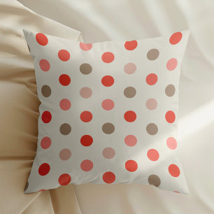 Geometrisches Polka-Punktmuster in Rot- und Rosatö Kissen