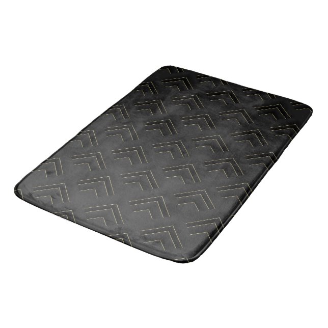 Geometrisches Schwarz-Gold-Muster Badematte (Schrägansicht)