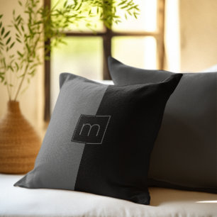Geometrisches, schwarz-grau geteiltes Design Kissen