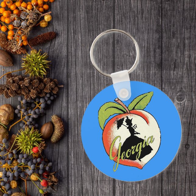 Georgia Peach Schlüsselanhänger (Southern bell lady silhouette on peach with Text Georgia on vibrant blue keychain.)