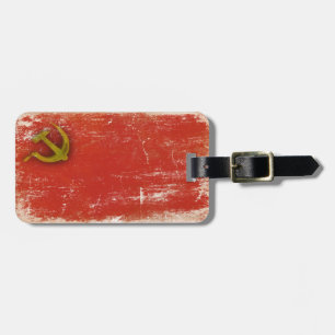 Gepäckanhänger mit schmutziger Flagge von der