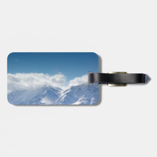 Gepäckumbau mit Foto von schneebedeckter Gepäckanhänger