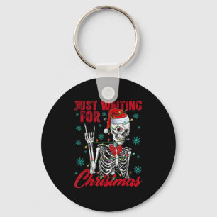 Gerade auf Weihnachten wartendes Skelett Rock Hand Schlüsselanhänger
