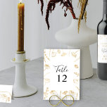 Gerahmte Skizze mit weißer und goldener Wildblume Tischnummer<br><div class="desc">Tischnummer-Karten - mit bearbeitbarer Tischnummer - in Weiß und Gold Wildblume Design. Delikate,  vergoldete Blume umrahmen Ihre Tischnummer,  in elegantem handgeschriebenem Schriftzeichen-Typografie und serifenem Schriftart geschrieben. Einfaches botanisches Blumendesign in skizzierter vergoldeter Linienkunst. Bitte stöbern Sie in meiner Sketch-Kollektion der Wildblume nach passenden Gegenständen.</div>