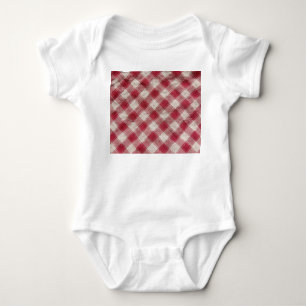 Geschirdigtes Textil: farbenfroher Stoffuntergrund Baby Strampler