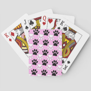 Gestresste schwarze und weiße Pfoten auf rosa Hint Spielkarten