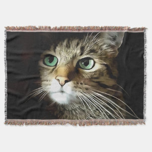 Getigerte Katze mit grünen Augen isoliert auf Schw Decke