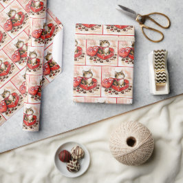 Getigertes Kätzchen in einer Valentinsherz-Schokol Geschenkpapier