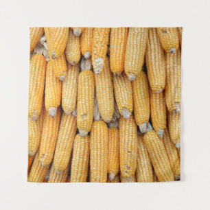 Getrockneter Mais, der gestapelt wurde. Wandteppich