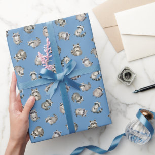 Geworfene Wasserfarben-Waschbären auf Blau Geschenkpapier