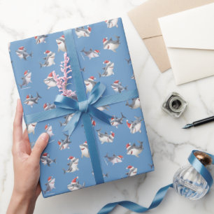 Geworfene Weihnachts-Haie auf Blau Geschenkpapier