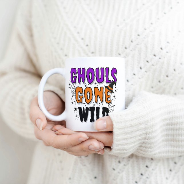 Ghouls est devenu sauvage Mug d'Halloween moderne (Woman in a white sweater holds a mug with the Ghouls Gone Wild mug.)