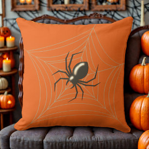 Giant Halloween Spider in seinem orangefarbenen We Kissen