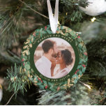 Gilded Greenery Green Married and Merry Two Photo Ornament<br><div class="desc">This gorgeous newlyweds holiday keepsake ornament feature a lush, festive wreath of gold leaves, Christmas greenery, and red holly berries on a modern forest green background. Your personal wedding photo goes in the center along with the words "Married and Merry", and there is even a spot for your name. A...</div>