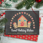 Gingerbrot House Sweet Wishings Chalkboard Festiva Feiertagskarte<br><div class="desc">"Süße Urlaubswünsche". Ein niedliches, skurriles Lebkuchenhaus, Lebkuchenmädchen und Junge, Stars, Herzen und Bonbons, zusammen mit spielerischer Schriftzeichen-Typografie, überlagern einen dunkelkohlegrauen Chalkboard-Hintergrund und helfen Ihnen, die Urlaubssaison zu beginnen. Ein Pfefferminzkerzenmuster auf einem roten Hintergrund schmückt den Rücken. Feiern Sie mit Familie und Freunden, während Sie die Wärme und Freude der Ferienzeit...</div>