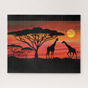 Giraffen in einem serengeti-afrikanischen Sonnenun