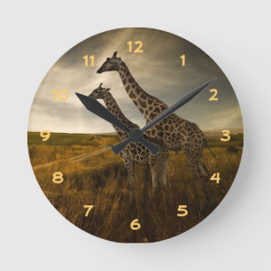 Giraffen und die Landschaft Runde Wanduhr