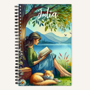 Girl Lesend a Book under a Tree with a Sleepy Cat Notizbuch