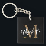 Girly Black Gold Monogram Name Elegantes Chic Scri Schlüsselanhänger<br><div class="desc">Girly Black Monogram Name Elegant Chic Script Schlüsselanhänger. Dieses moderne,  elegante Schlüsselanhänger mit Ihrem individuellen Monogramm und Namen ist einfach zu personalisieren.</div>