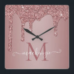 Girly Rose Gold Sparkle Glitter Drips Monogram Quadratische Wanduhr<br><div class="desc">Girly Rose Gold Sparkle Glitter Drips Monogram Wall Clock for your baby's room with fashion faux blush pink/rose gold glitter drips on a chic background with your custom monogram and name. This cute design is easy to customize for your baby or toddler's bedroom. Please contact us at cedarandstring@gmail.com if you...</div>