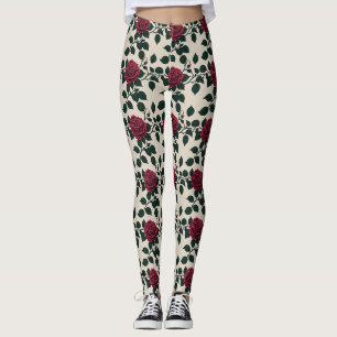 Glänzende karmesinrote Rosen mit dunkelgrünen Blät Leggings