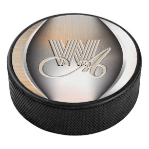 Glänzendes, gebürstetes Stahlmonogramm Eishockey Puck